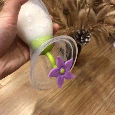 Tapón de Flor de silicona para recolector de leche materna Haakaa - Imagen 11